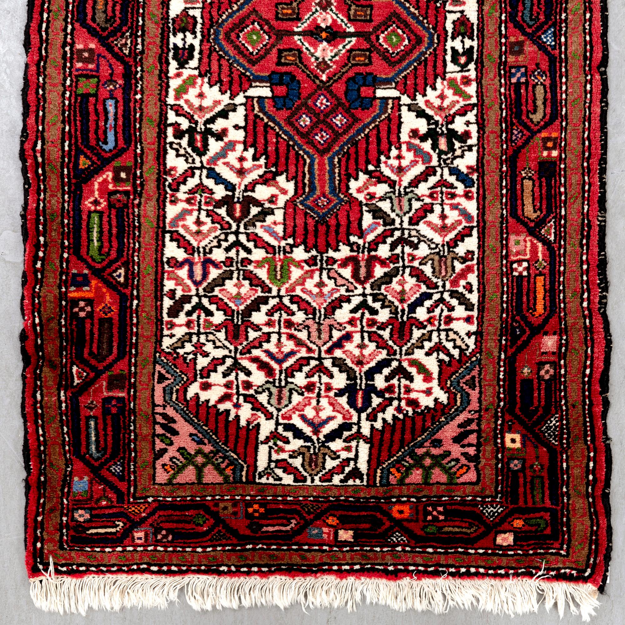 A semiantique hamadan runner ca 289x83 cm.