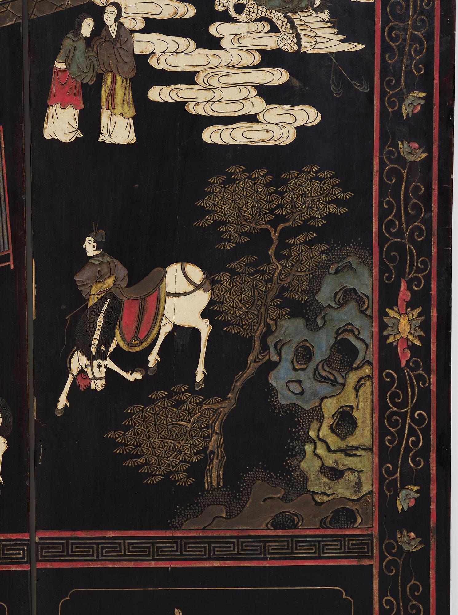 A Chinese four panel lacquer folding screen, first part of the 20th century.