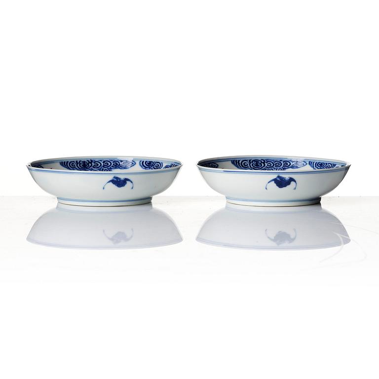 A pair of underglaze blue and and iron-red 'wufu' dishes, Qing dynasty with Guangxu mark and of the period (1875-1908).