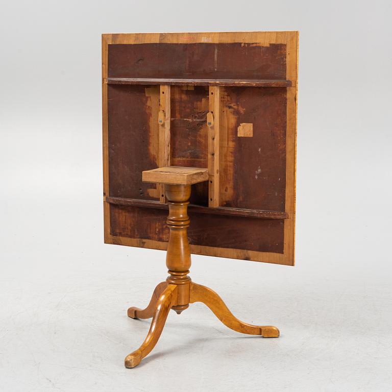 A late 19th century tilt-top table.
