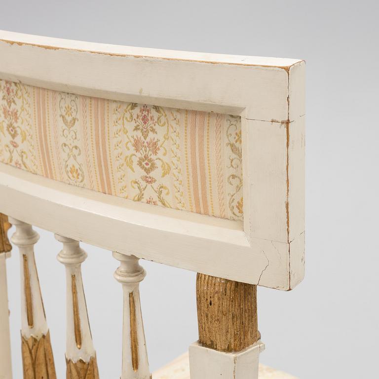 A pair of chairs and an armchair, late Gustavian style, early 20th century.