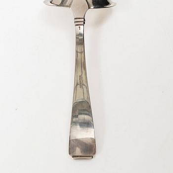 Gustaf Möllenborg, a silver bowl, Stockholm 1851, six silver punch cups, including CG Hallberg, and a silver spoon.