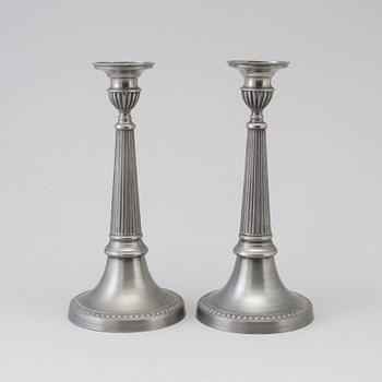 a pair of pewter candle sticks by B O Santesson Stockholm 1983.