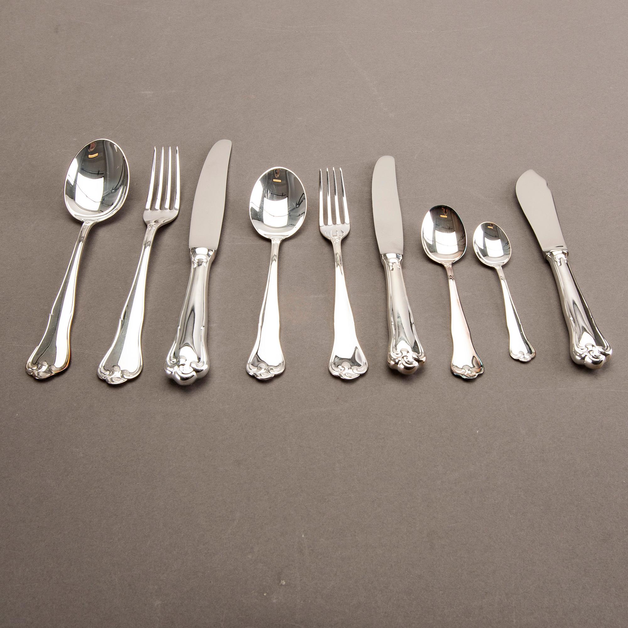 A Swedish 20th century set of 99 silver cutlery mark of Mema Linköping 1982, weight including cartoons 3140 gr.