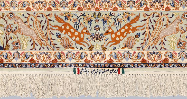 A Figural Isfahan carpet, part silk, 238 x 160 cm.