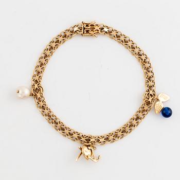 18K gold bracelet, with charms.