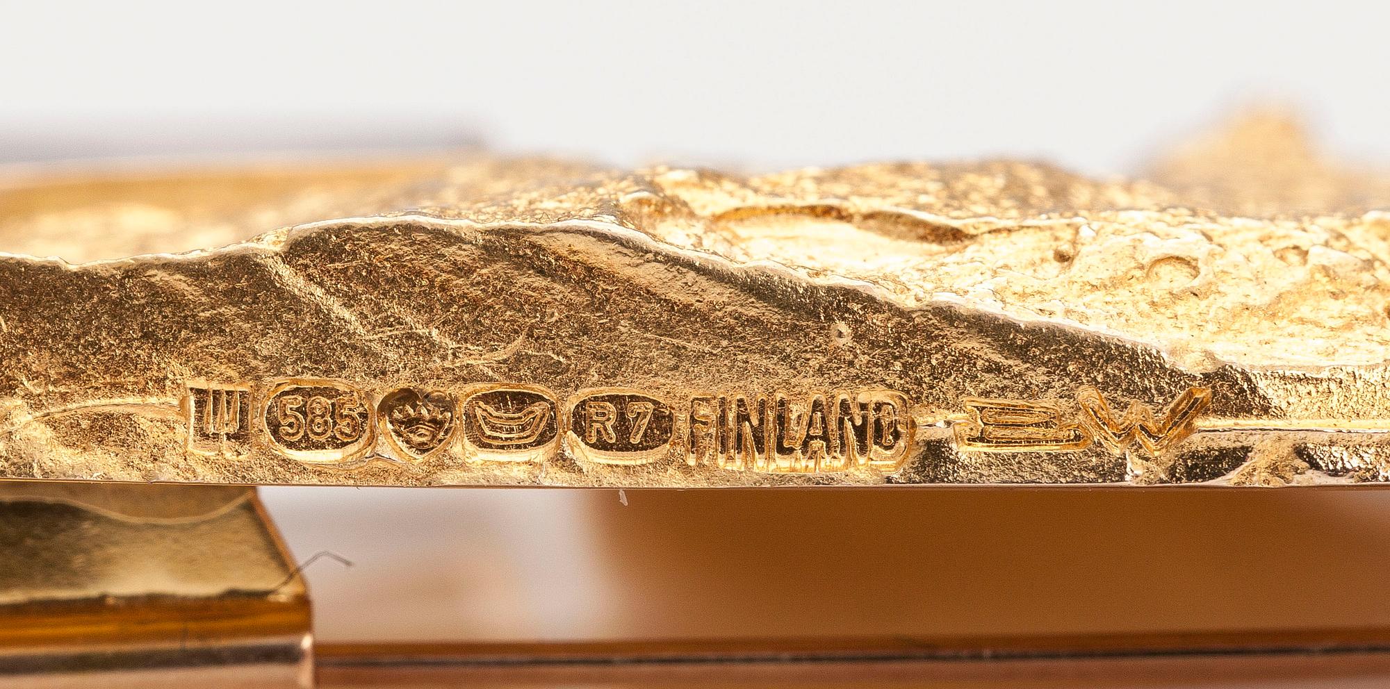 BJÖRN WECKSTRÖM, A 14K gold brooch "Chrystal and cut" with a smoky quartz. Lapponia 1970.