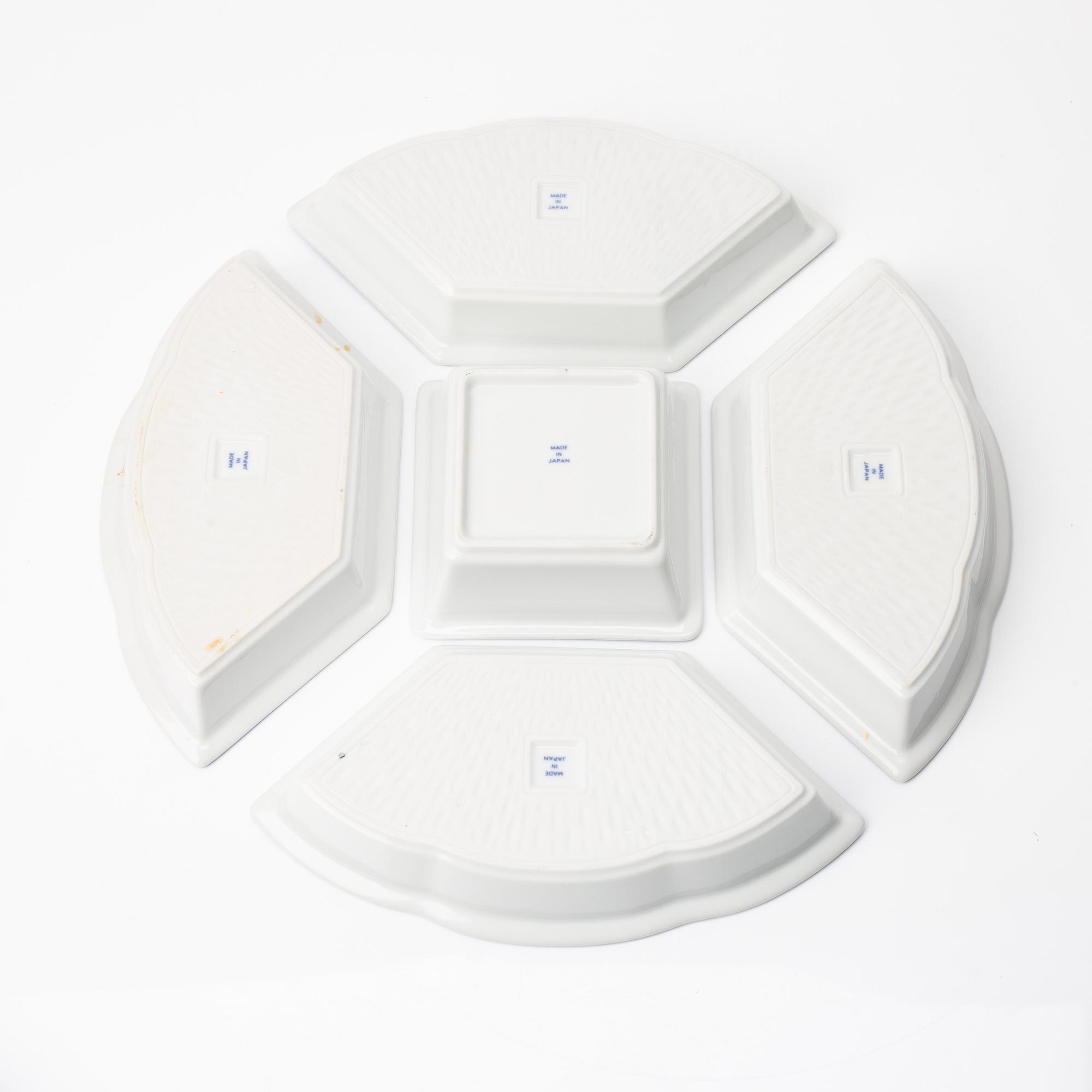 A Japanese blue and white six piece cabaret on a 'lazy Susy', secon half of the 20th century.