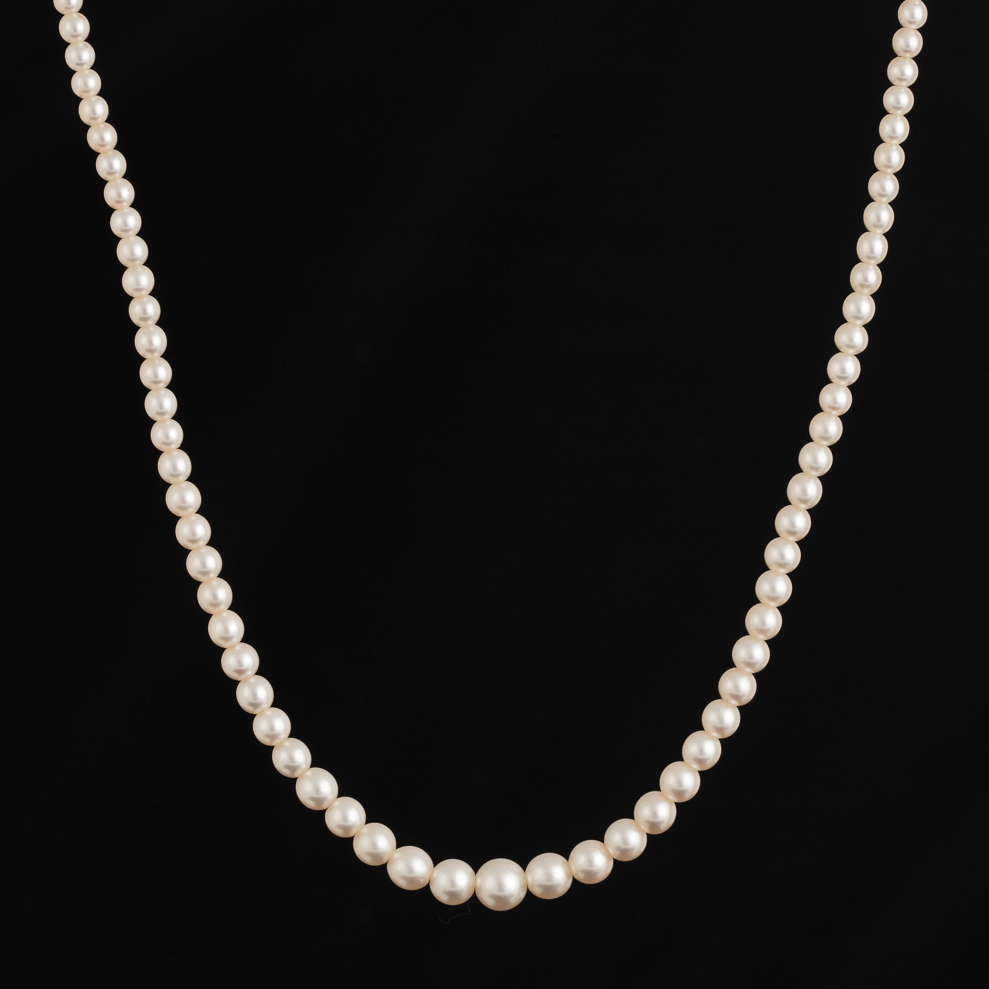 Pearl necklace, clasp platinum and old cut diamond.