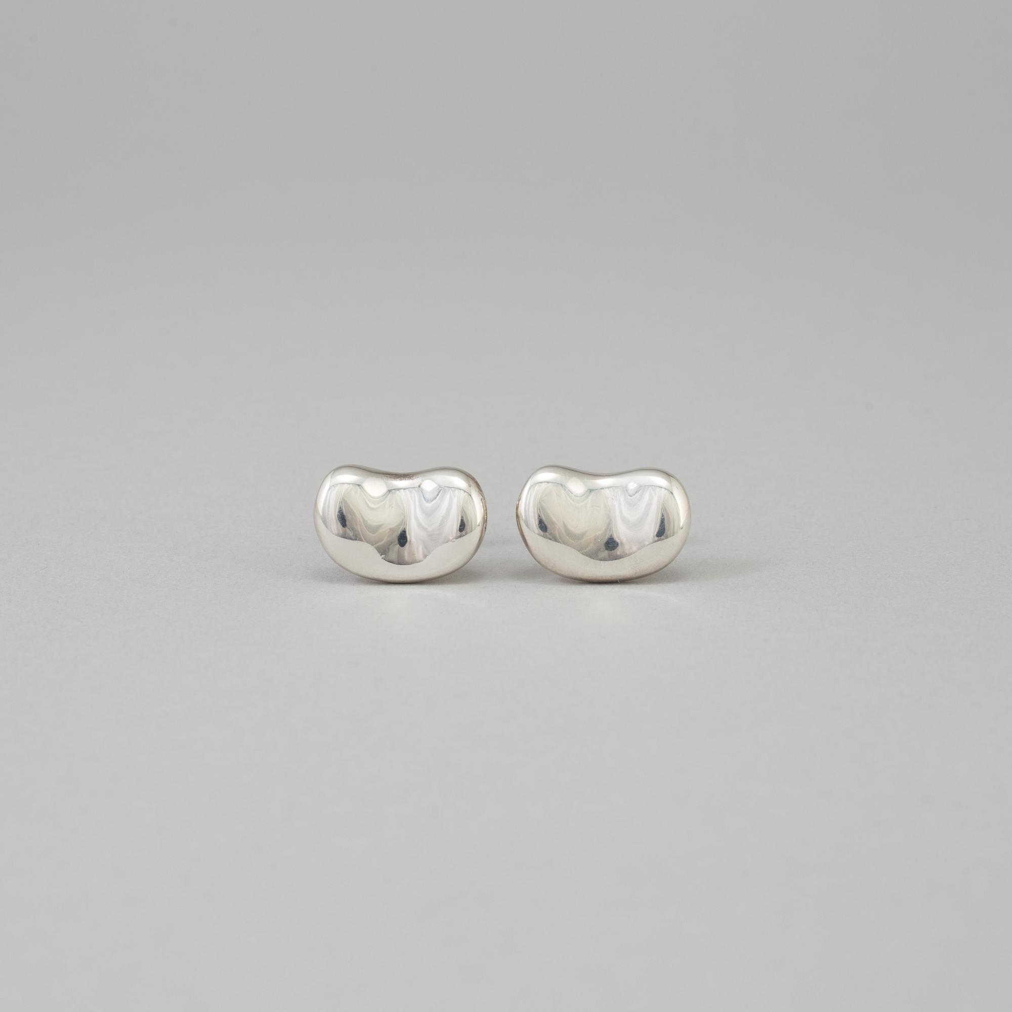 A pair of sterling cufflinks by Elsa Peretti for Tiffany & co.