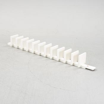 A 'Pilaster' shelf by John Kandell for Källemo, designed 1988.