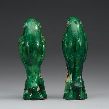 A set of two green glazed falcons, China.