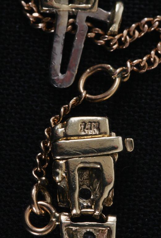ARMBAND, 14 K guld samt briljanter, 11 g.