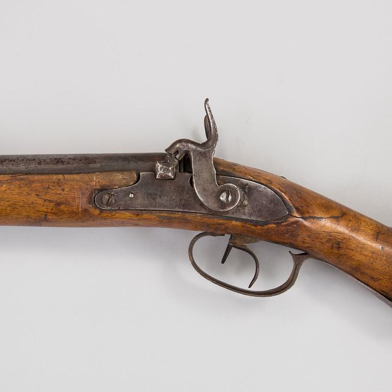 A double barrel caplock rifle mid 1800s.