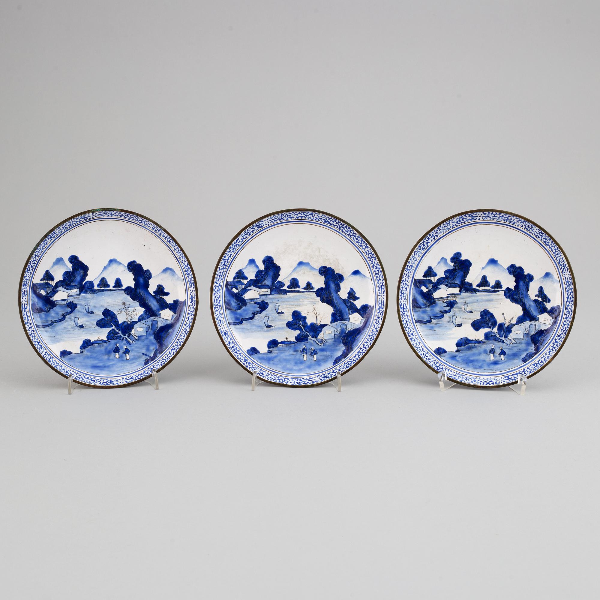 Three enamel on copper dishes, Qing dynasty, 19th century.