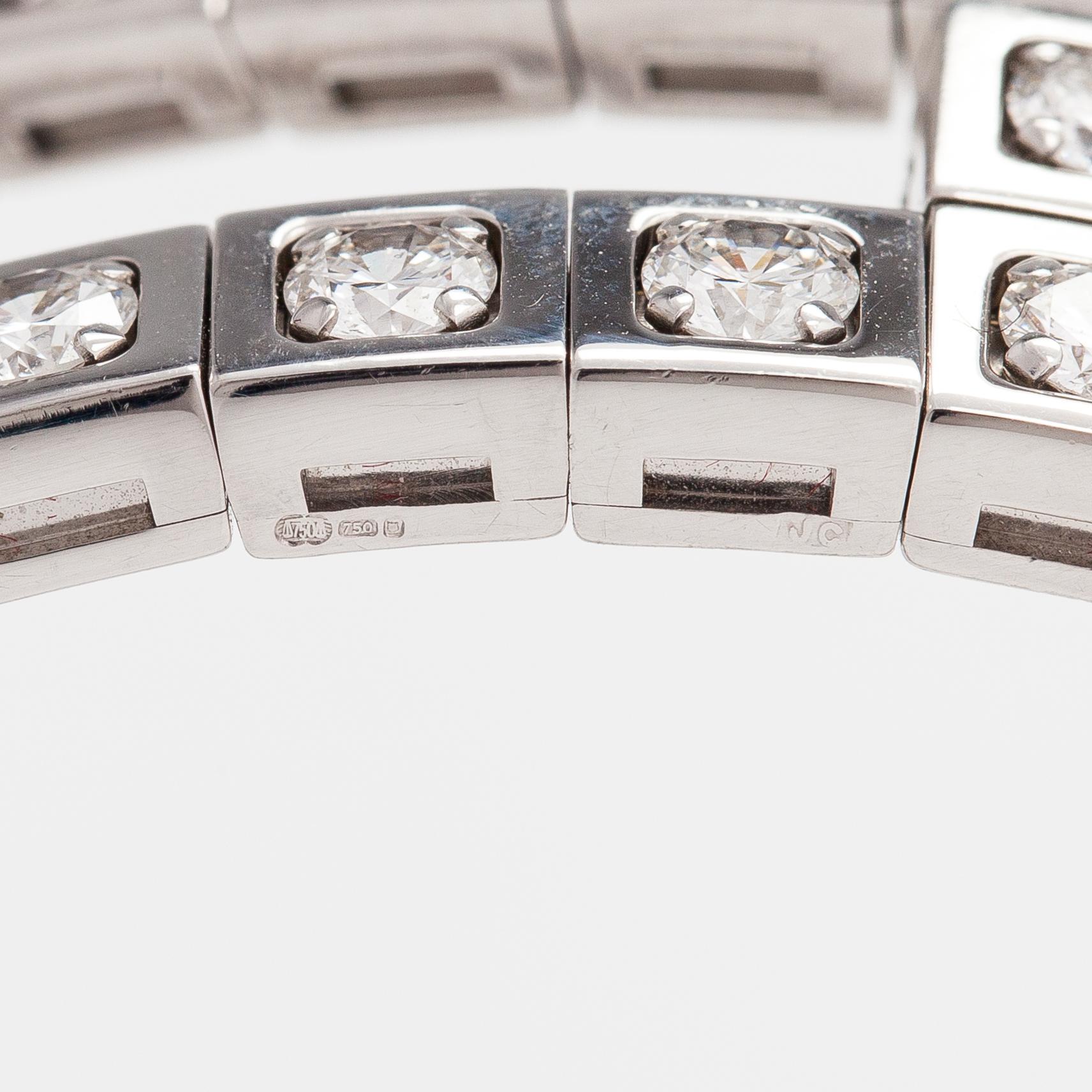 Cartier, Rannekoru "Tectonique", 18K valkokultaa, briljanttihiottuja timantteja n. 11.90 ct yht. Merkitty CT6808, JC.