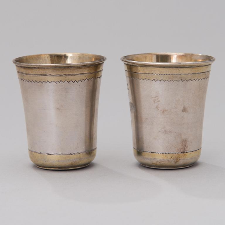 A pair of Russian, partially gilt  silver beakers, master mark of Iщ, Moscow 1880s.