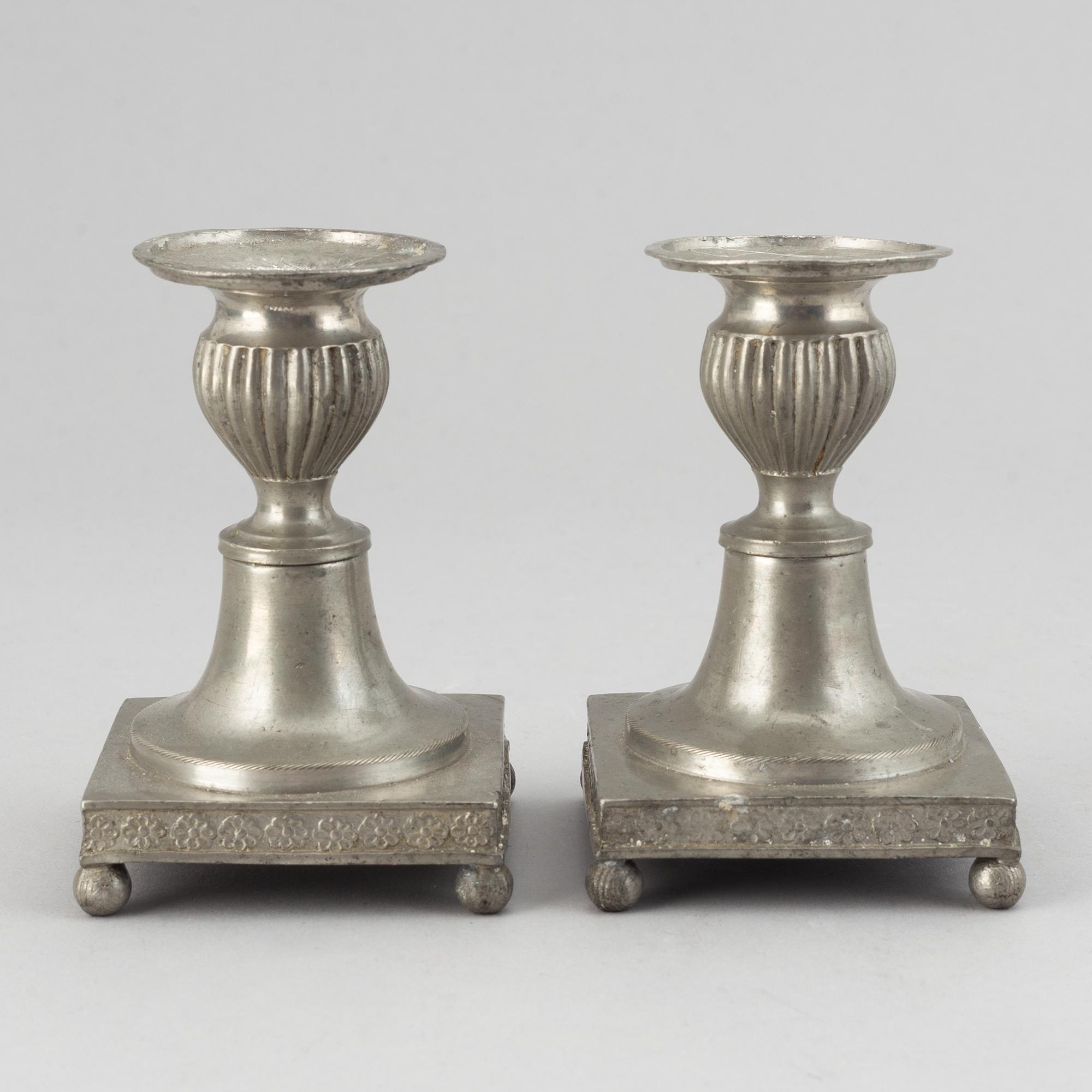 A pair of pewter candlesticks by Niclas Anström, Växjö 1835.
