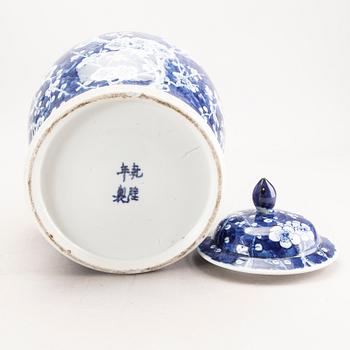 A Chinese 20th century porcelain blue and white urn with lid.