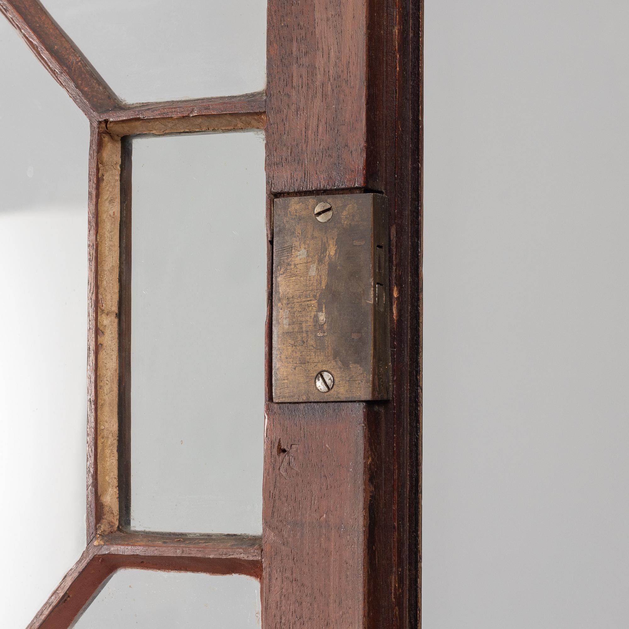 An English mahogany cabinet, 19th Century.