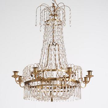 A late Gustavian nine-light gilt brass and cut glass chandelier, Stockholm, late 18th century.