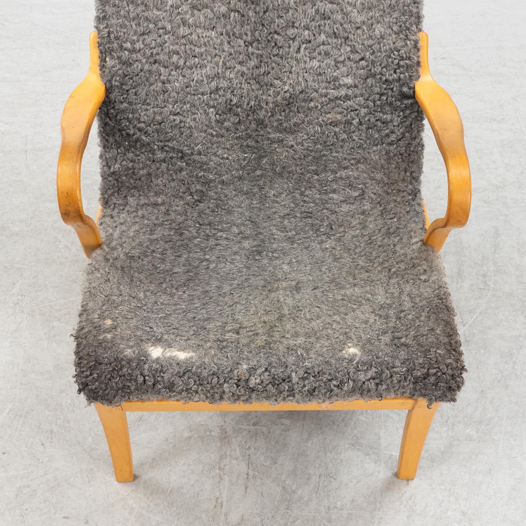 Bruno Mathsson, fåtölj och fotpall "Pernilla", Bruno Mathsson International 2004.