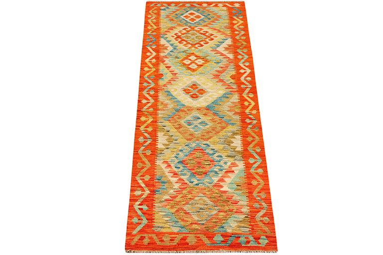 A Kilim runner, Afghanistan, c. 253 x73 cm.