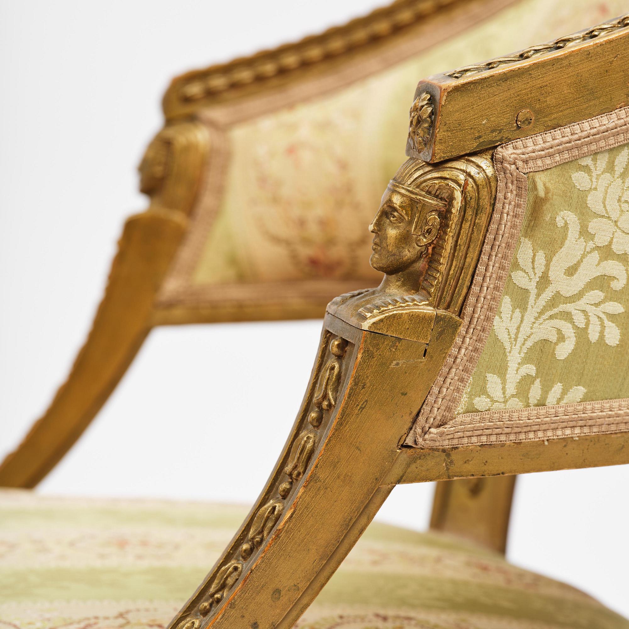 A pair of late Gustavian open armchairs attributed to E. Ståhl (master in Stockholm 1794-1820).