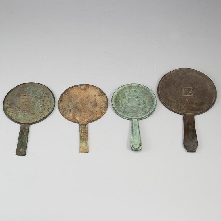 A set of four Chinese bronze mirrors, Qing dynasty (1664-1912).