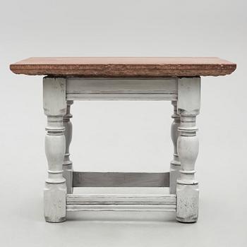 A limestone-top table, Sweden, 18th century.