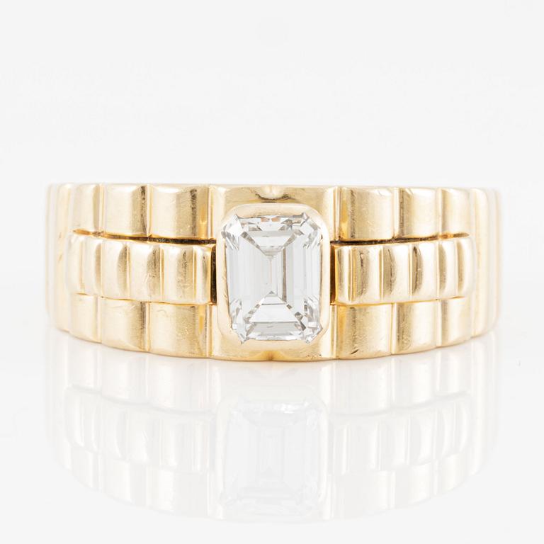 Ring, 18K gold with emerald-cut diamond.