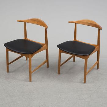 A pair of 1960's 'Danske' oak armchairs by Erik Wörtz IKEA.
