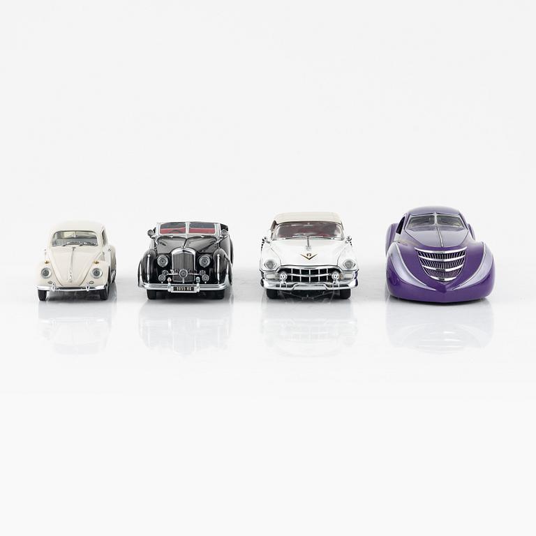 Four die cast model cars and four die cast model motor bikes, Franklin Mint.