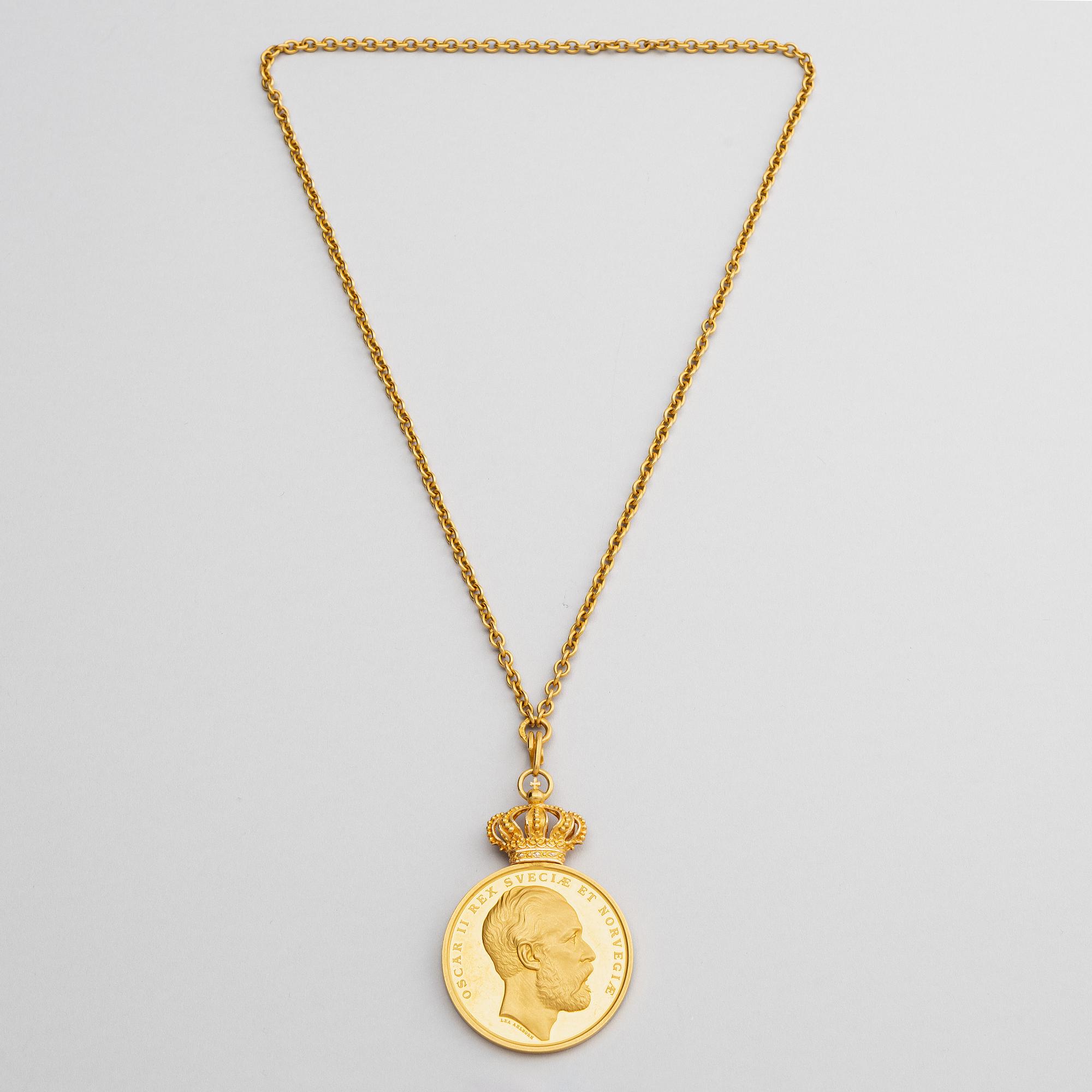 The Royal Illis Quorum medal in gold with chain awarded to Ludvig Berckhan Falkman.
