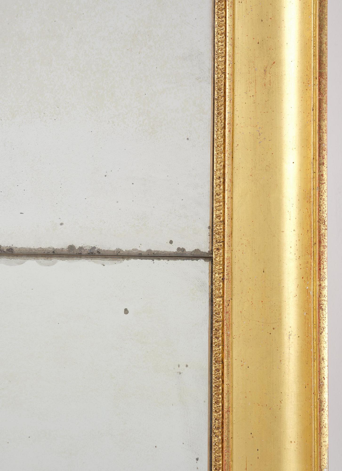 A Swedish giltwood Empire mirror, first part 19th century.