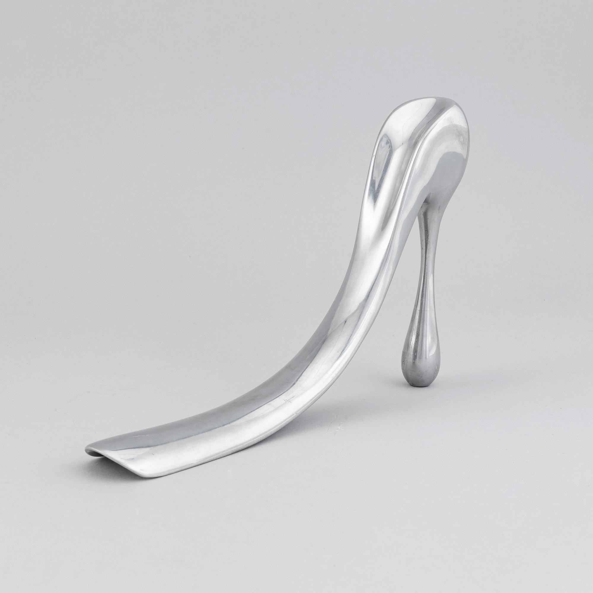 A metal shoe horn by Manolo Blahnik, 2000s.