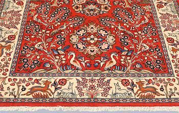 A Sarouk rug, approx. 212 x 140 cm.