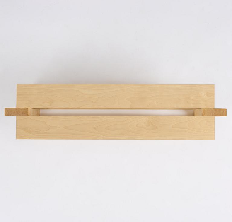 Nick Ross, an "Arrangement #16" coffe table/bench, executed in his studio, Stockholm, 2024.