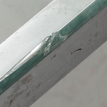A TOBIA SCARPA GLASS TOP SOFA TABLE.