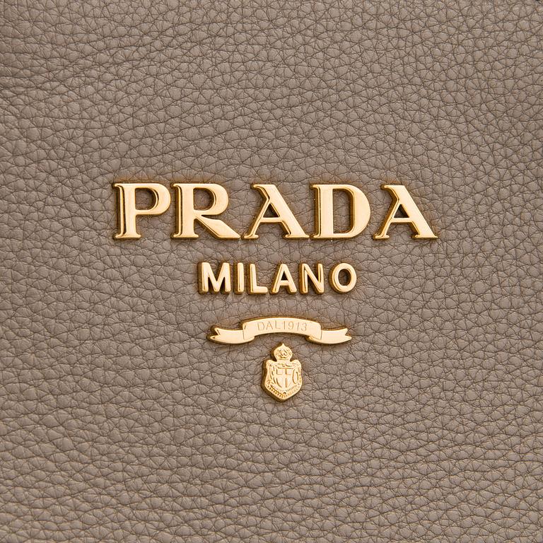 Prada, a clay gray leather handbag, 2020.