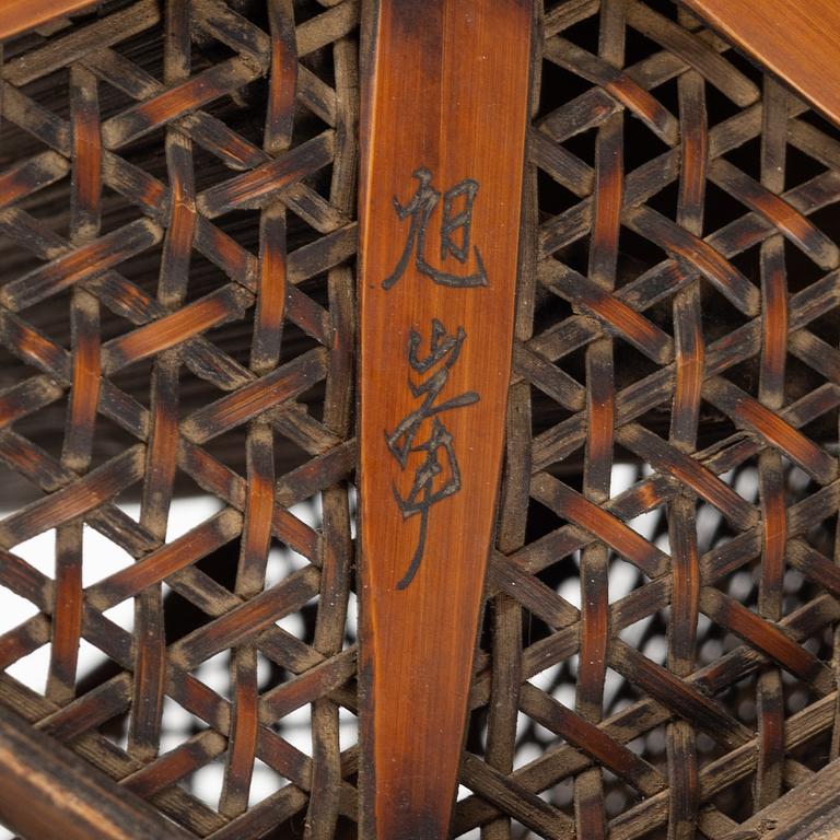 A signed Japanese Ikebana flower basket, 20th Century.