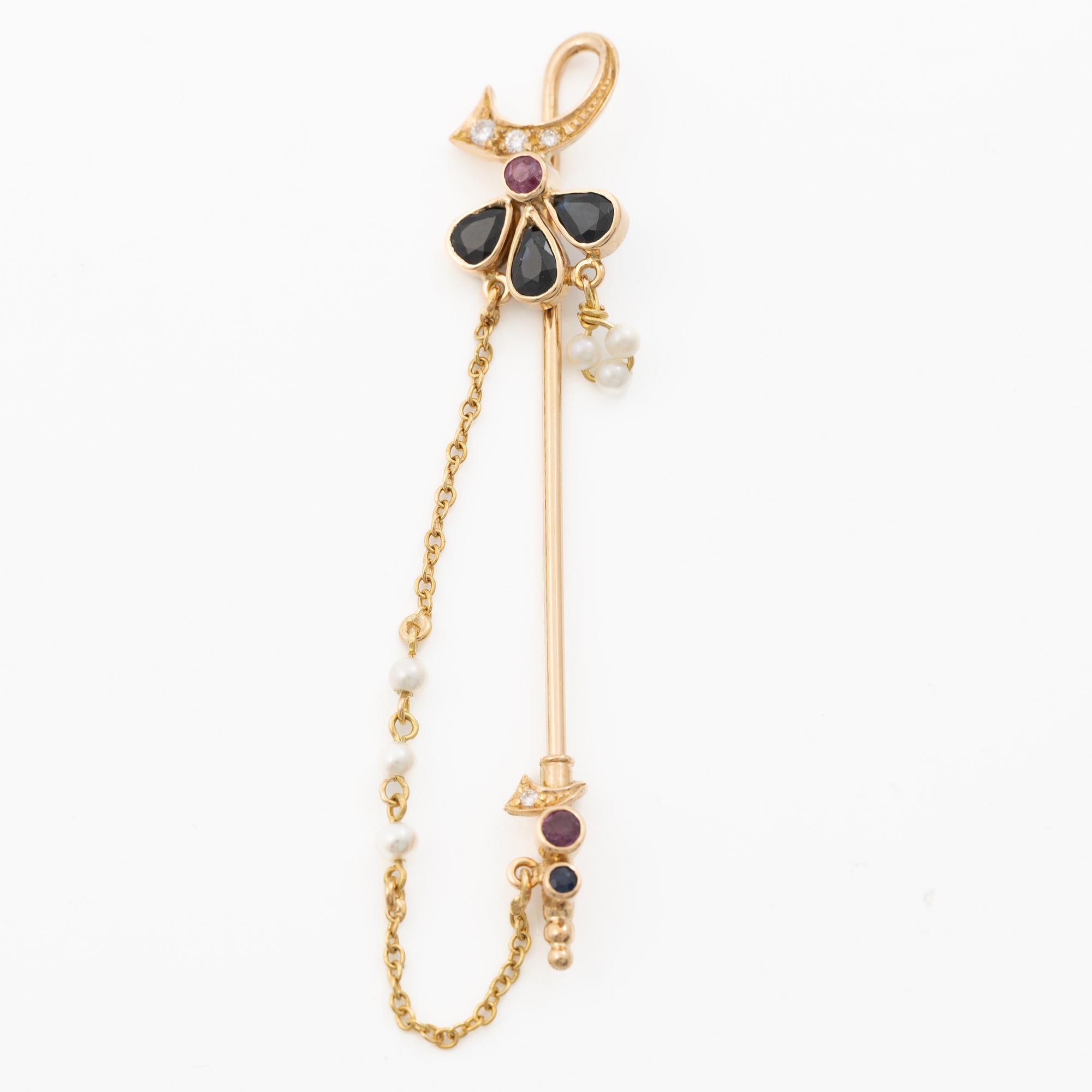 Lapel pin, 18K gold with brilliant-cut diamonds, sapphires, a ruby and pearls.