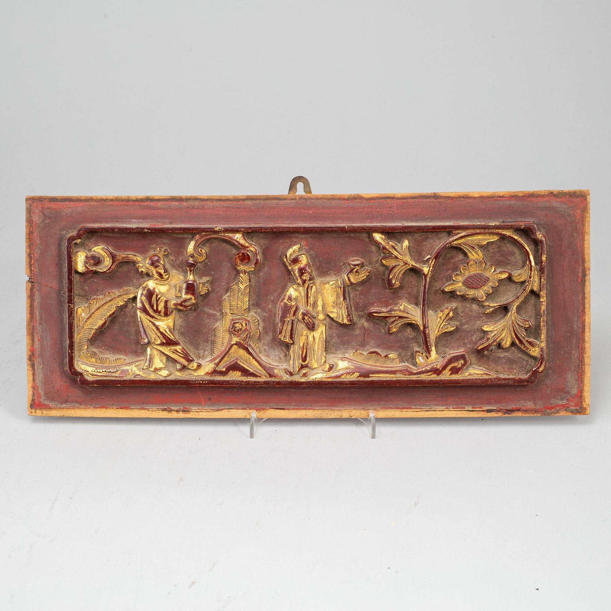 A wooden tray and two panels, Qing dynasty, 19th Century.
