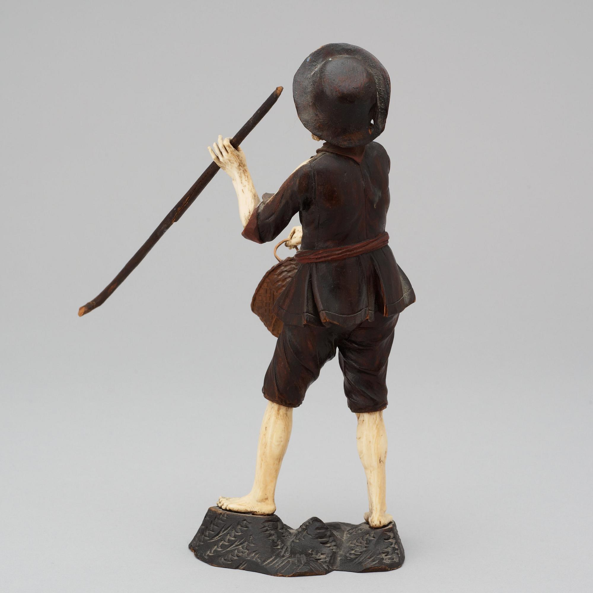 A German 18th century figurine in Simon Trogers manner.