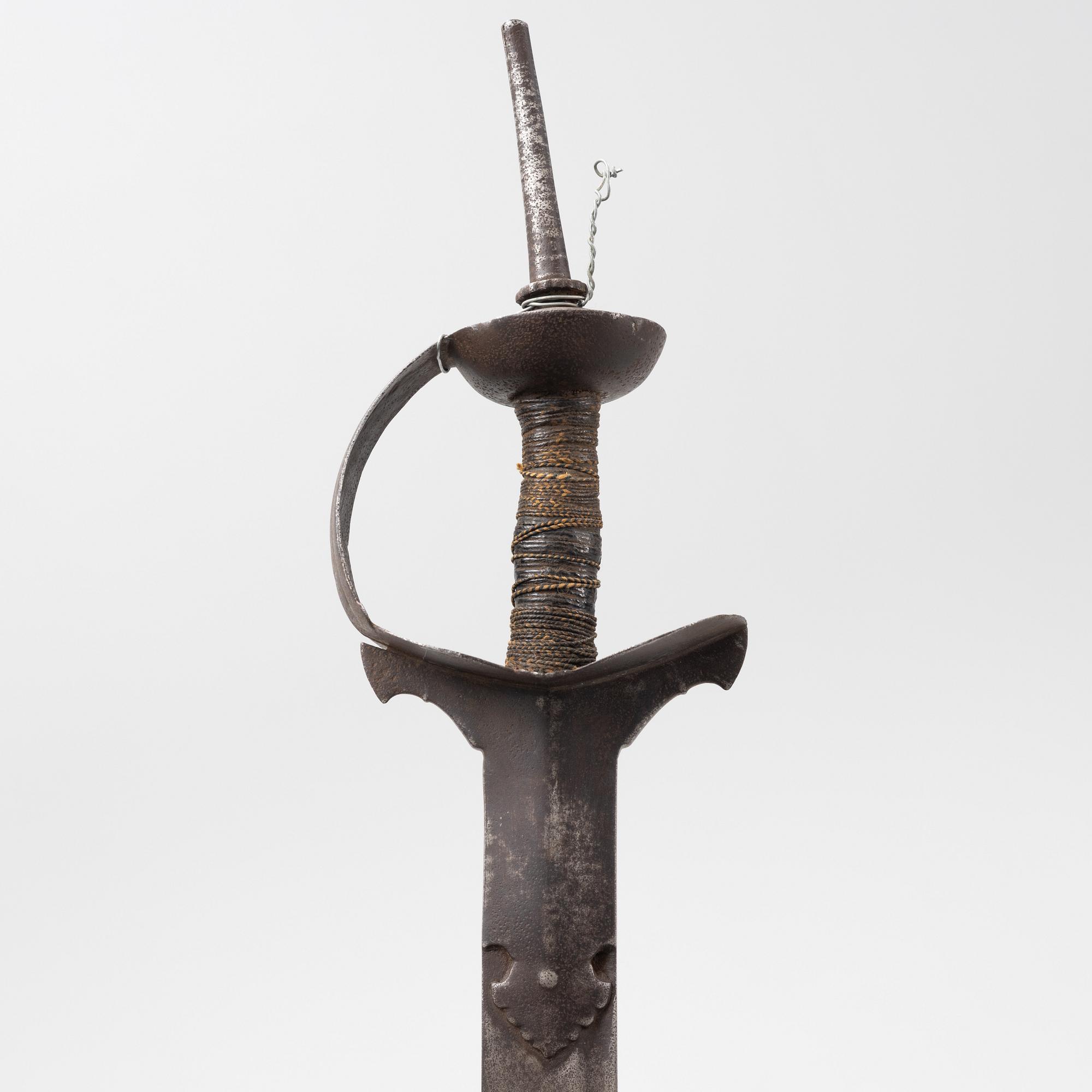 An Indian Khanda style sword, 19th / 20th Century.
