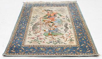 An Isfahan, figural rug, signed, c. 172 x 109 cm.