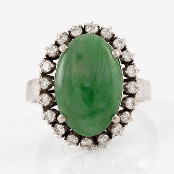 Ring, 14K white gold set with cabochon-cut probably jadeite and small brilliant-cut diamonds.