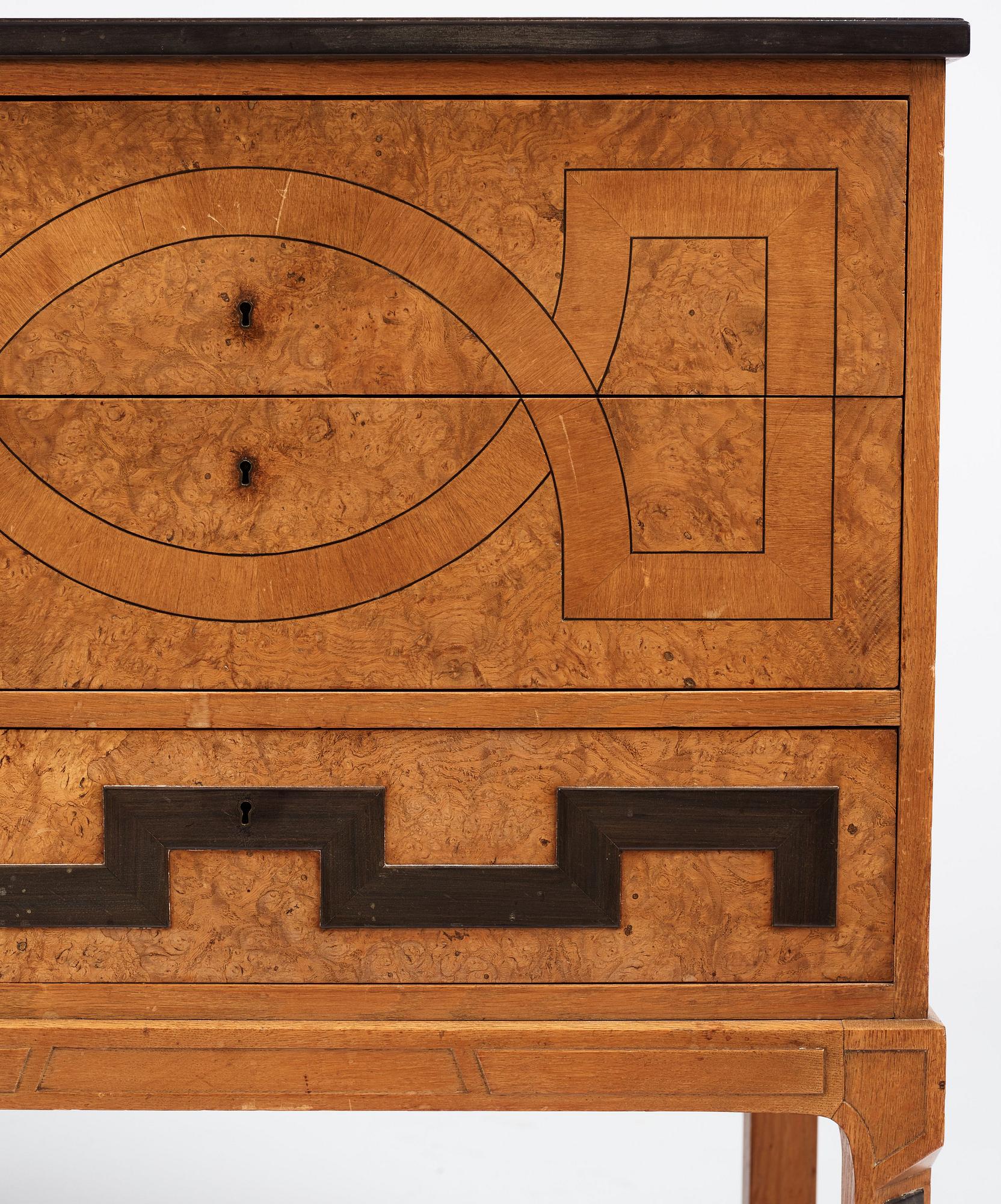 Carl Bergsten, an oak veneered sideboard/ chest of drawers, Nordiska Kompaniet Sweden 1923. Part of a set exhibited in Gothenburg 1923.