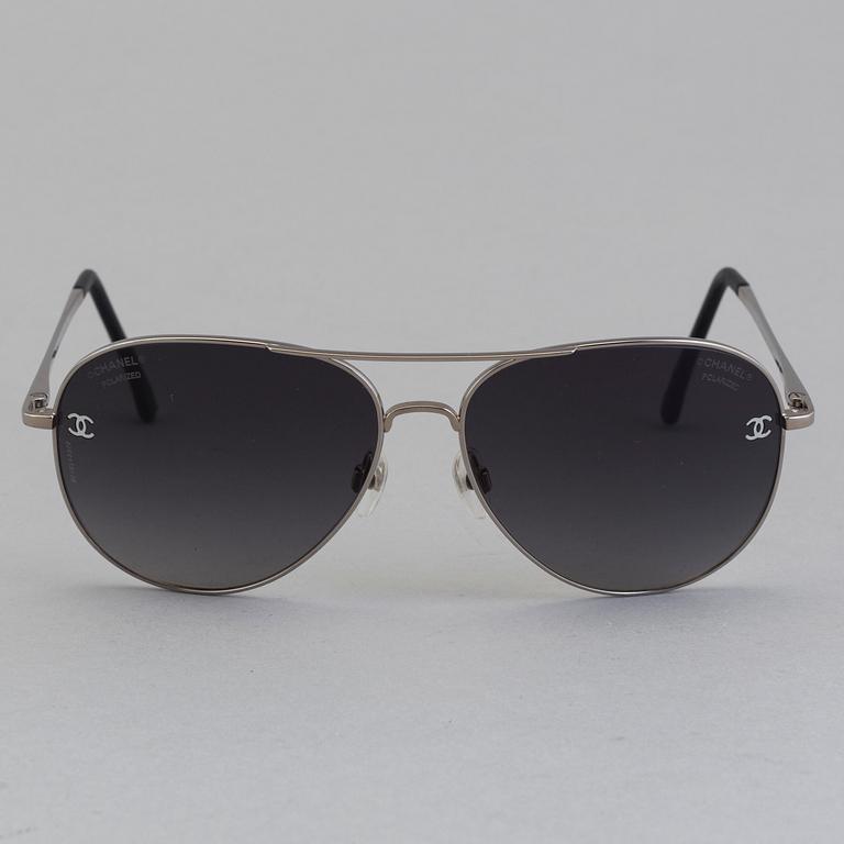 Chanel silver and black pilot summer sun glasses.