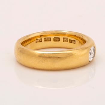 J Butler Malmö 1996 , ring 18K guld med en oval-slipad briljant ca 0,40 ct.